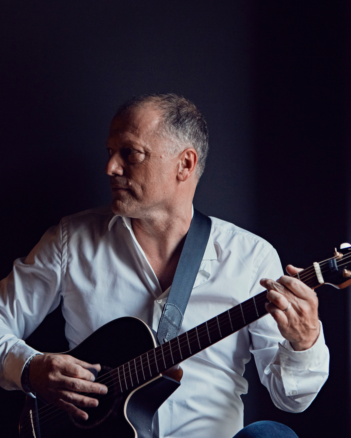 004 Hotel Liberty Dietmar Funk Playing Guitar