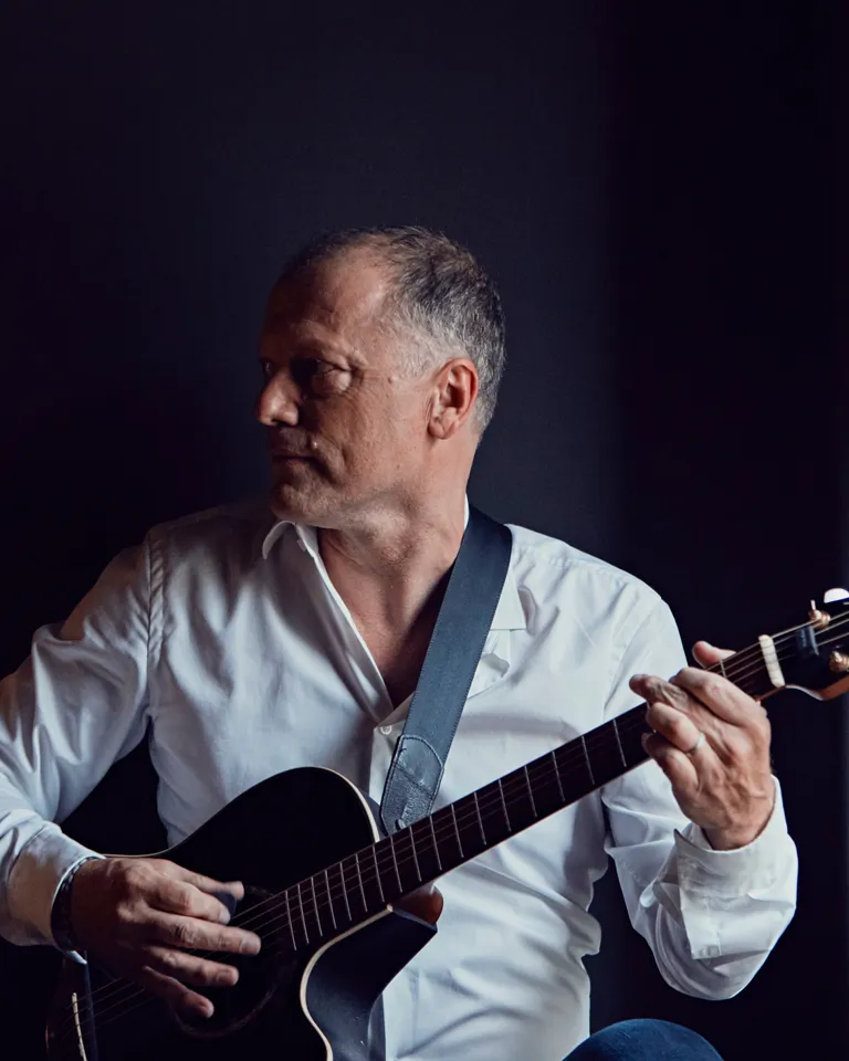 004 Hotel Liberty Dietmar Funk Playing Guitar