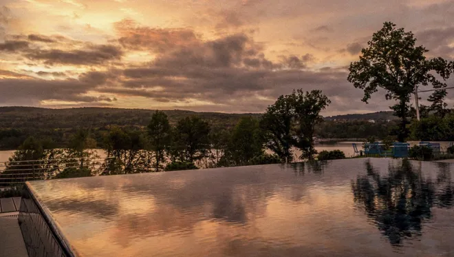 05 BP Well Being Destinations Seezeitlodge Hotel And Spa Pool Landscape View By Sundown